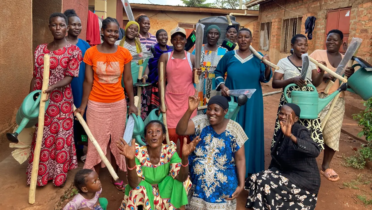 SHINE 5 participants after receiving farming tools